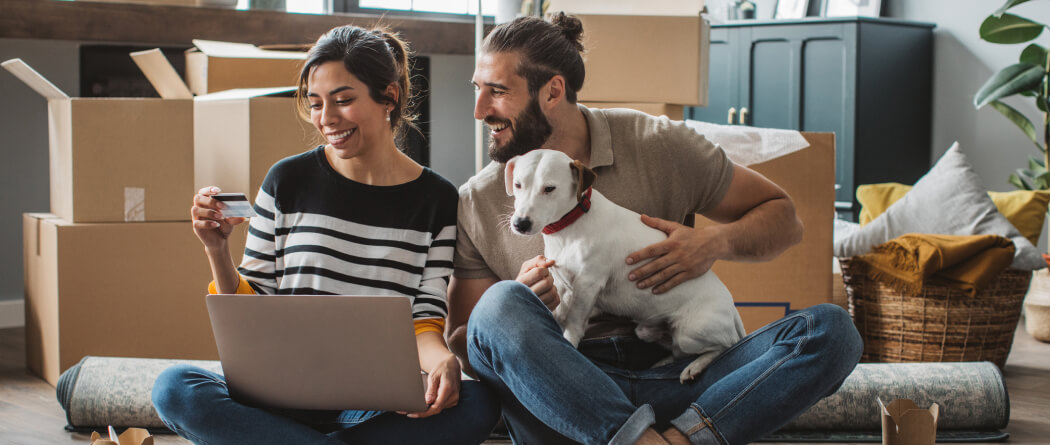 Couple looking at laptop